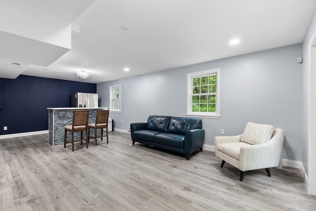 3 Anders Way, Acton, MA 01720 - living area featuring light wood finished floors, baseboards, recessed lighting, and bar area