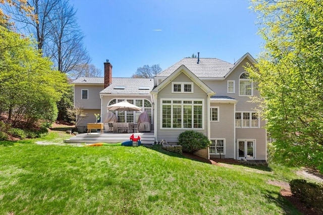 3 Anders Way, Acton, MA 01720 - back of property with a lawn, a wooden deck, and a chimney