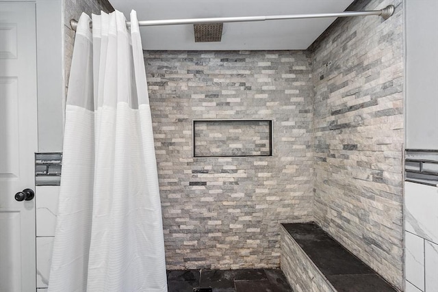 bathroom with walk in shower