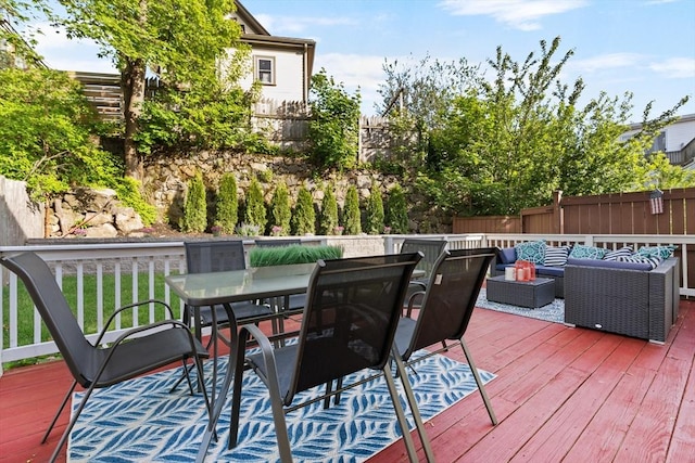 31-33 New Ocean St, Swampscott, MA 01907 - deck with outdoor lounge area, outdoor dining space, and a fenced backyard