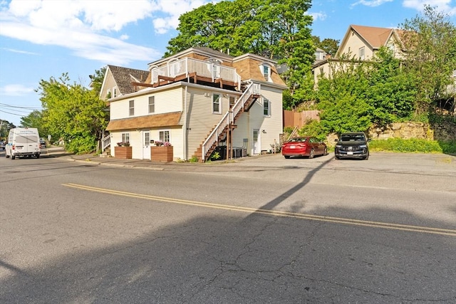 31-33 New Ocean St, Swampscott, MA 01907 - view of front facade with stairs and a balcony