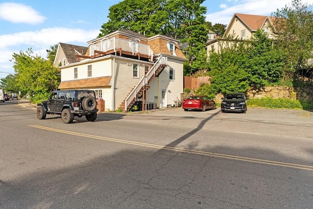 31-33 New Ocean St, Swampscott, MA 01907 - view of front of home featuring stairway and a balcony