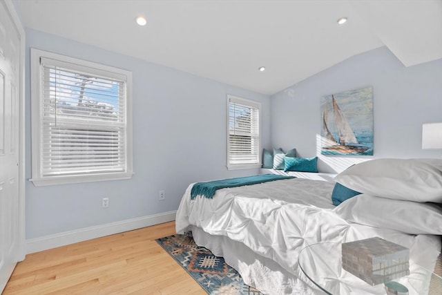 31-33 New Ocean St, Swampscott, MA 01907 - bedroom with lofted ceiling, wood finished floors, and recessed lighting