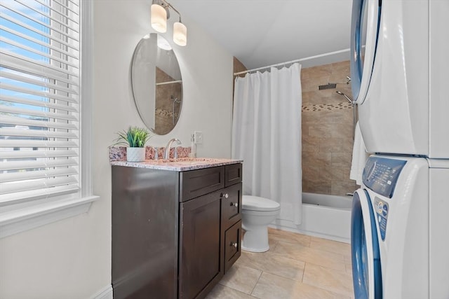 31-33 New Ocean St, Swampscott, MA 01907 - bathroom with stacked washing machine and dryer, vanity, and shower / bath combo with shower curtain