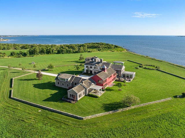 birds eye view of property with a water view and a rural view