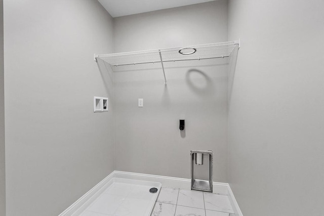 washroom featuring washer hookup and electric dryer hookup