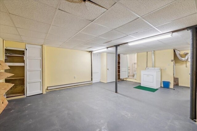 7 Wilbur Ct, Saugus, MA 01906 - unfinished basement featuring washer / clothes dryer, a baseboard radiator, and a drop ceiling