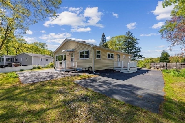 7 Wilbur Ct, Saugus, MA 01906 - view of front of house with a wooden deck