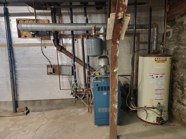 utility room with gas water heater