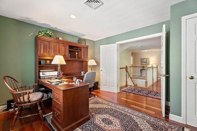 office space with dark wood-style floors, baseboards, and recessed lighting