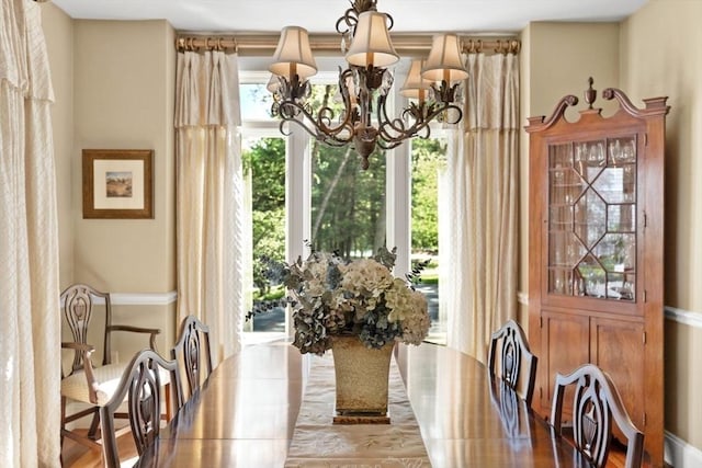 dining area featuring a chandelier