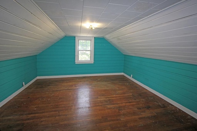 1 Stratford Rd, Holyoke, MA 01040 - additional living space with hardwood / wood-style flooring, vaulted ceiling, baseboards, and wood walls