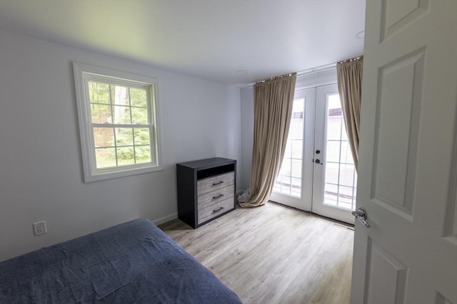 400 Loomis St, Westfield, MA 01085 - bedroom with access to exterior, french doors, light wood-style flooring, and baseboards