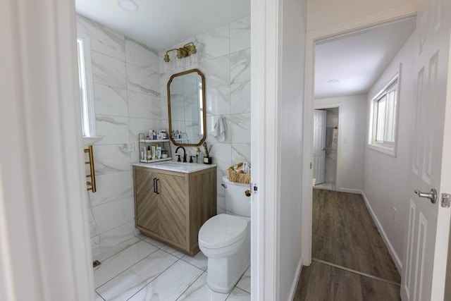 400 Loomis St, Westfield, MA 01085 - bathroom with toilet, vanity, and tile walls