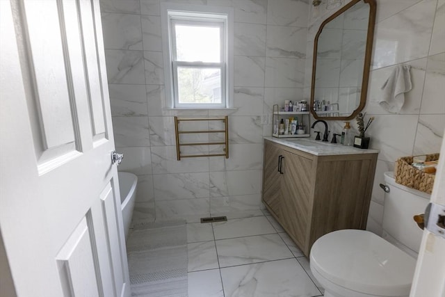 400 Loomis St, Westfield, MA 01085 - bathroom with tile walls, toilet, vanity, and marble finish flooring