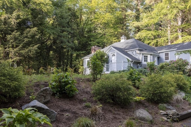 400 Loomis St, Westfield, MA 01085 - view of property exterior with a chimney and a view of trees