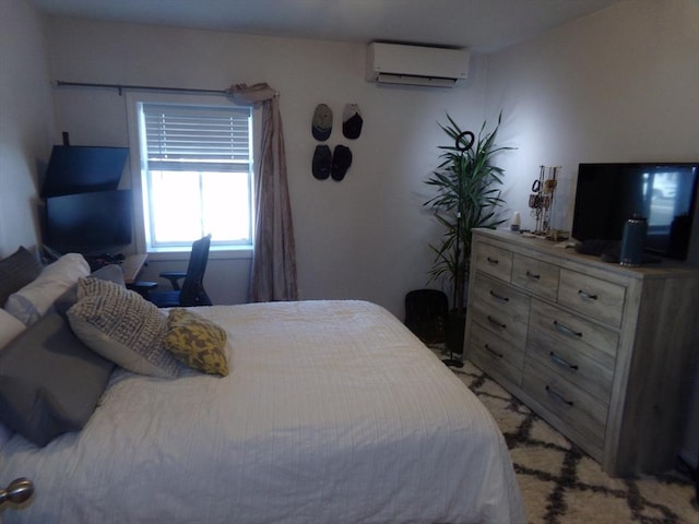 bedroom featuring a wall mounted AC