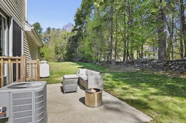view of yard featuring central AC unit, an outdoor hangout area, and a patio