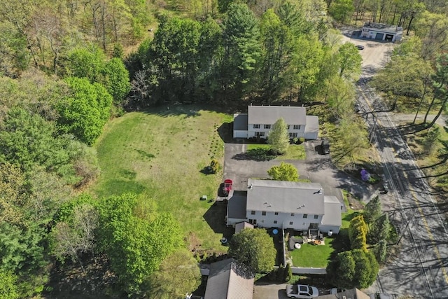 bird's eye view featuring a view of trees