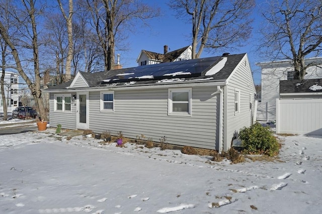 exterior space featuring solar panels