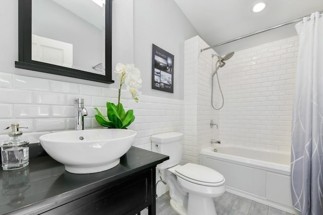 43 Endicott St Unit 43, Salem, MA 01970 - full bathroom with shower / bathtub combination with curtain, vanity, tile walls, and wood finished floors