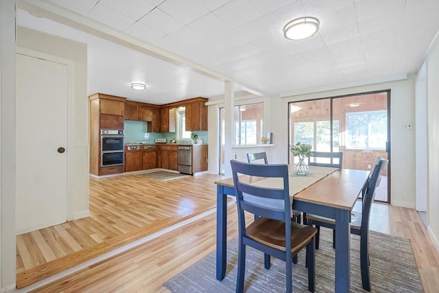 dining room featuring light wood-type flooring