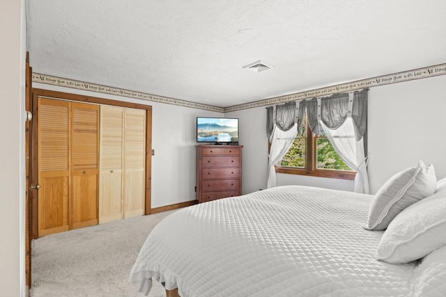 111 Esta Rd, Plymouth, MA 02360 - bedroom with carpet, a closet, baseboards, and a textured ceiling