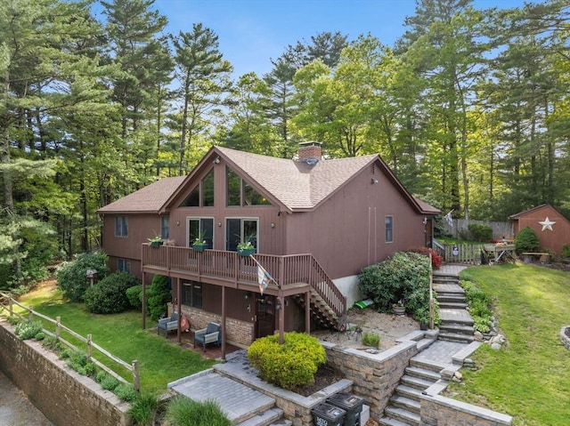 111 Esta Rd, Plymouth, MA 02360 - rear view of house with stairway, a deck, a shingled roof, and a yard