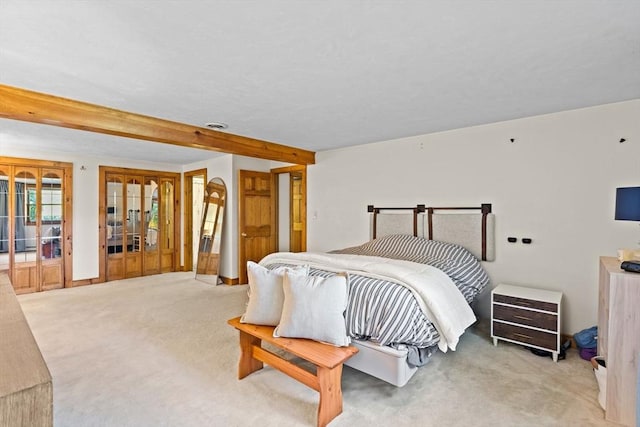 111 Esta Rd, Plymouth, MA 02360 - bedroom featuring light colored carpet, french doors, and beam ceiling