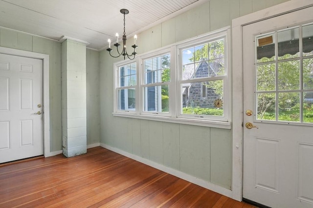 270 Main St, Oxford, MA 01540 - unfurnished dining area with hardwood / wood-style floors, a chandelier, and baseboards
