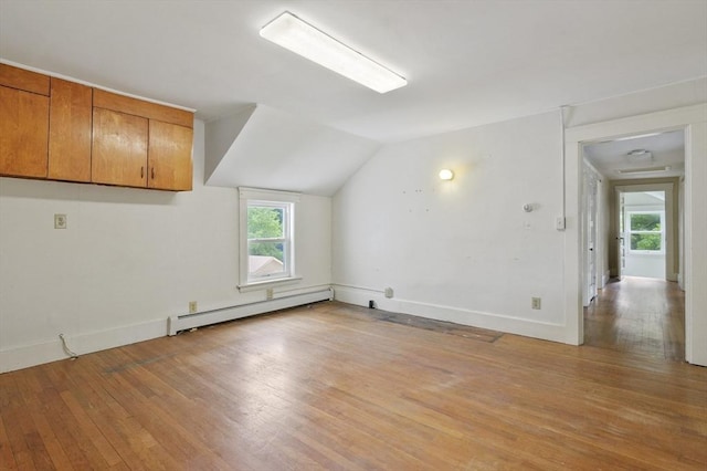 270 Main St, Oxford, MA 01540 - bonus room with baseboard heating, light wood-type flooring, lofted ceiling, and baseboards