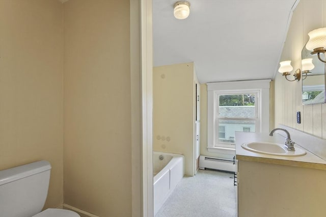 270 Main St, Oxford, MA 01540 - bathroom with a baseboard radiator, vanity, and toilet