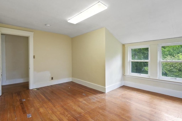 270 Main St, Oxford, MA 01540 - unfurnished room with light wood-type flooring, baseboards, and lofted ceiling