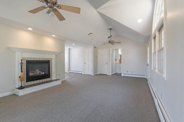 unfurnished living room featuring a baseboard heating unit, lofted ceiling, visible vents, and ceiling fan