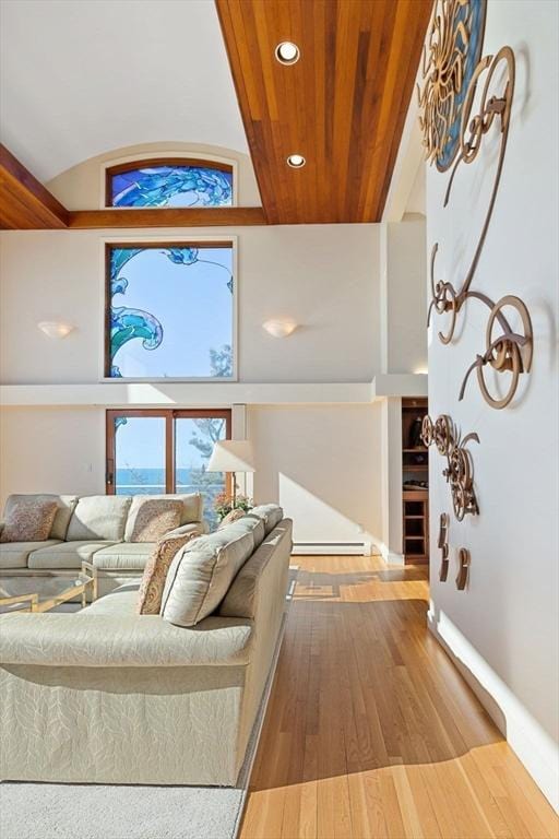 living room featuring recessed lighting, wood ceiling, lofted ceiling, and wood finished floors