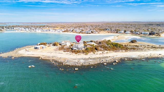 drone / aerial view with a water view and a view of the beach