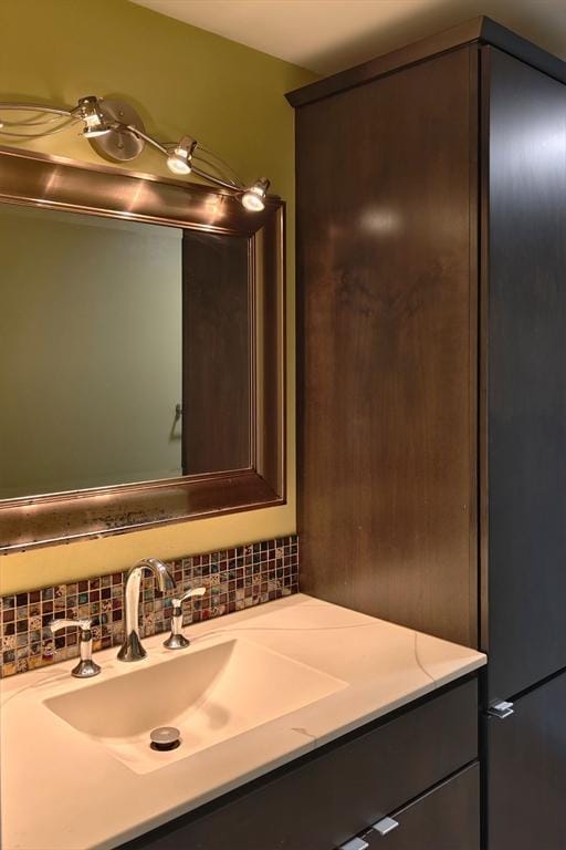8 9th St Unit 406, Medford, MA 02155 - bathroom with vanity and decorative backsplash