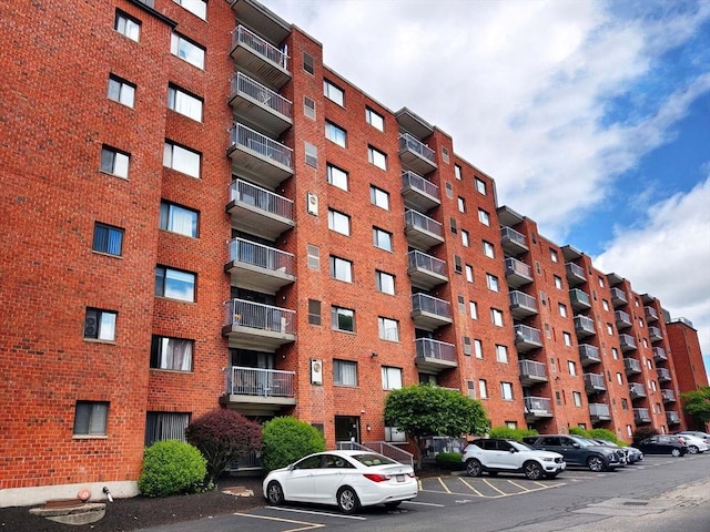 8 9th St Unit 406, Medford, MA 02155 - view of apartment building / complex featuring uncovered parking