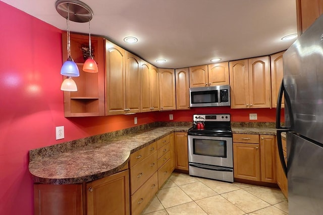 8 9th St Unit 406, Medford, MA 02155 - kitchen with stainless steel appliances, dark countertops, light tile patterned flooring, recessed lighting, and pendant lighting