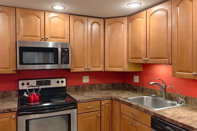 8 9th St Unit 406, Medford, MA 02155 - kitchen featuring stainless steel appliances, dark countertops, and recessed lighting