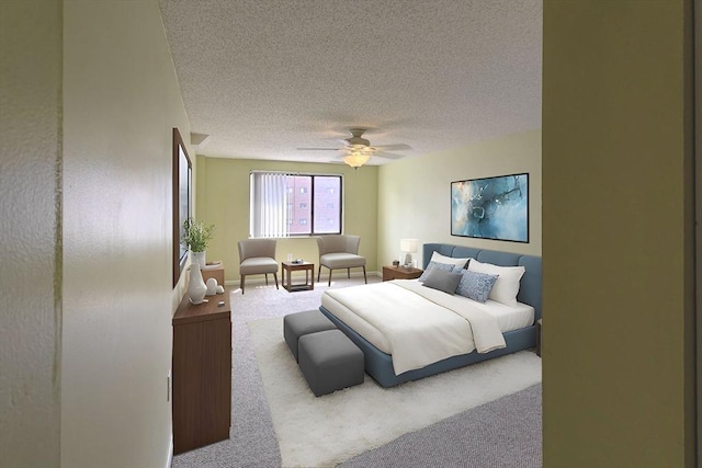 8 9th St Unit 406, Medford, MA 02155 - bedroom featuring carpet flooring, a textured ceiling, and a ceiling fan