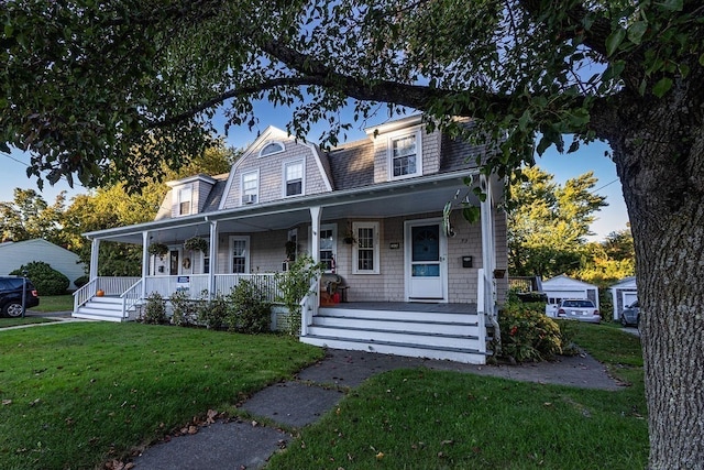 view of front of home with a front lawn and a porch