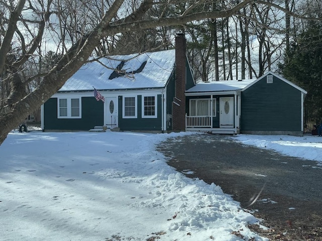 view of front of home with a chimney