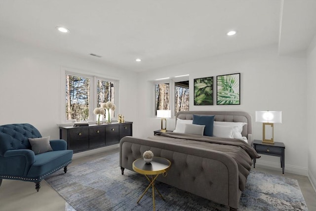 bedroom with baseboards, visible vents, and recessed lighting