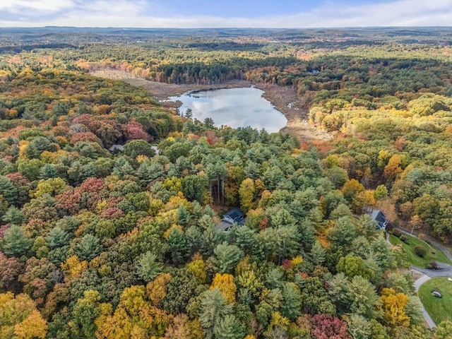 aerial view with a water view and a wooded view