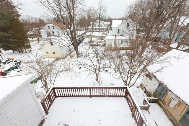 view of snow covered deck