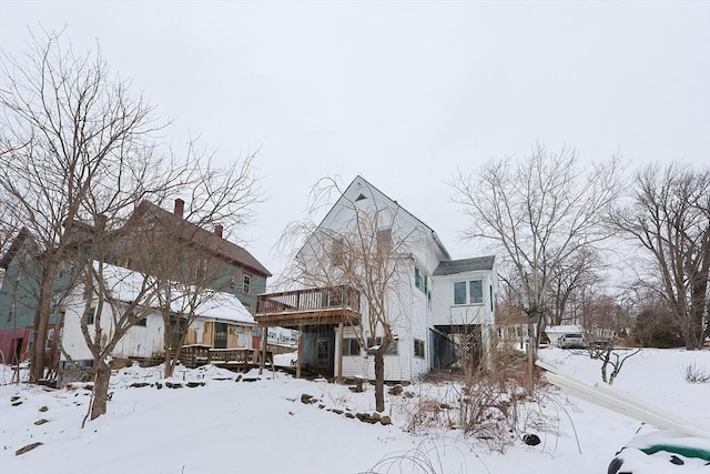 view of front facade with a wooden deck