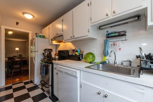 57 Saint Paul St Unit 19, Brookline, MA 02445 - kitchen with white appliances, a sink, light flooring, light countertops, and white cabinets