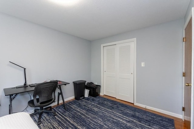 57 Saint Paul St Unit 19, Brookline, MA 02445 - office area featuring wood finished floors and baseboards