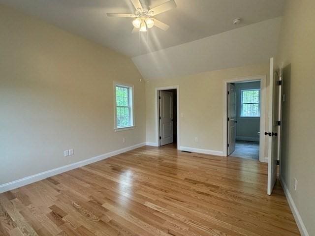 70 Kilburn St, Lunenburg, MA 01462 - unfurnished room featuring plenty of natural light, a ceiling fan, light wood-style floors, and lofted ceiling